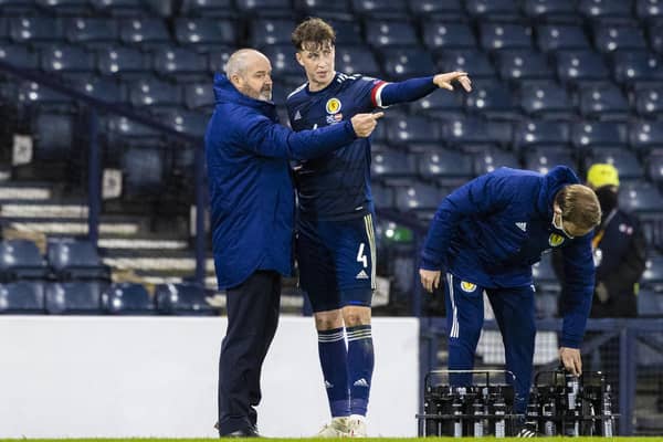 Scotland manager Steve Clarke (left) chats to Jack Hendry during a World Cup qualifier against Austria at Hampden in 2021. Hendry could reach 25 caps in this international window  (Photo by Craig Williamson / SNS Group)