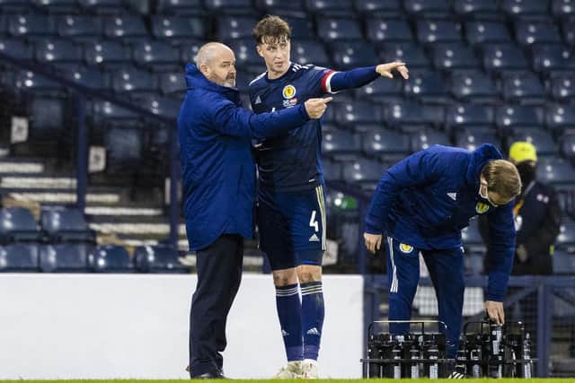 Scotland manager Steve Clarke (left) chats to Jack Hendry during a World Cup qualifier against Austria at Hampden in 2021. Hendry could reach 25 caps in this international window (Photo by Craig Williamson / SNS Group)