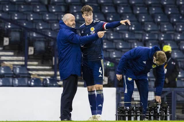 Scotland manager Steve Clarke (left) chats to Jack Hendry during a World Cup qualifier against Austria at Hampden in 2021. Hendry could reach 25 caps in this international window  (Photo by Craig Williamson / SNS Group)