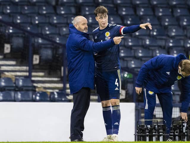 Scotland manager Steve Clarke (left) chats to Jack Hendry during a World Cup qualifier against Austria at Hampden in 2021. Hendry could reach 25 caps in this international window  (Photo by Craig Williamson / SNS Group)