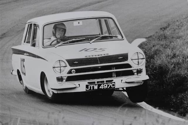 Classic image of Jim Clark cornering his Lotus Cortina