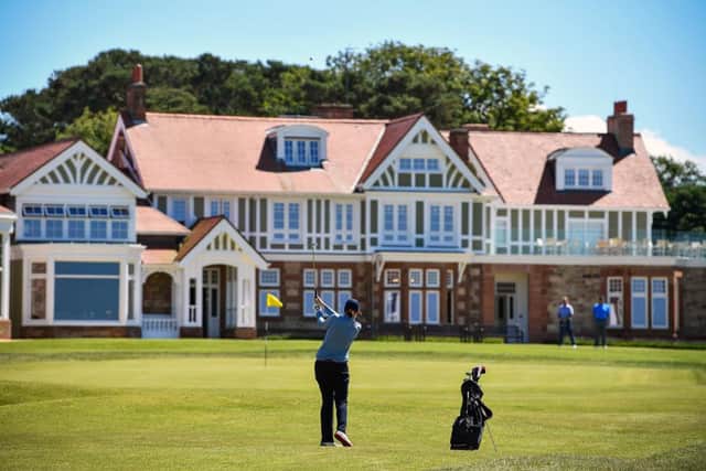 A lady golfer plays at Muirfield, where the AIG Women's Open is being held for the first time in 2022. Picture: Jeff J Mitchell/Getty Images.