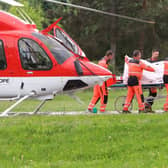Slovak Prime Minister Robert Fico is transported from a helicopter by medics and his security detail to the hospital in Banska Bystrica, where he is being treated. Picture: AFP via Getty Images