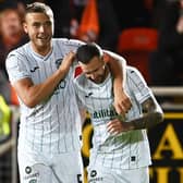 Hibs defender Ryan Porteous with his former team-mate Martin Boyle. (Photo by Paul Devlin / SNS Group)