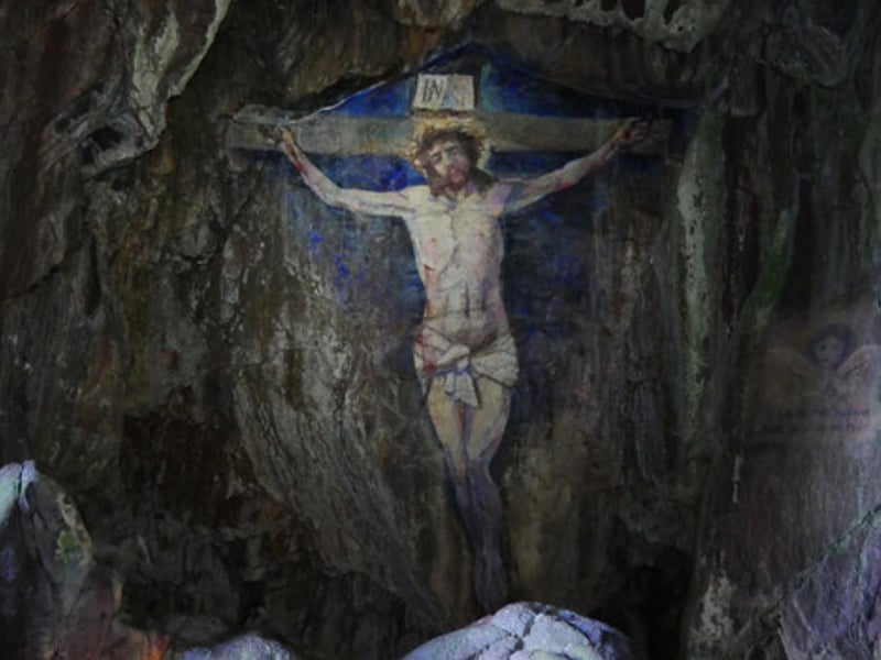 Crucifixion Cave sits on Davaar Island at the mouth of Campbeltown Loch off the east coast of Kintyre in Argyll and Bute. The cave is famous for a stunning life-sized painting of the Crucifixion decorating its interior. It was painted by a local art teacher, Archibald MacKinnon, in 1887 who did so after a dream prompted him to. The painting has been maintained other the years but was once defaced by an image of Che Guevara, a former minister of Cuba who - although widely praised - also helped create the first Cuban concentration camp.