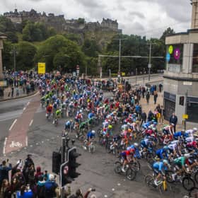 The men's elite road race crosses Princes Street in Edinburgh during the UCI Cycling World Championships last August. Picture: Katielee Arrowsmith