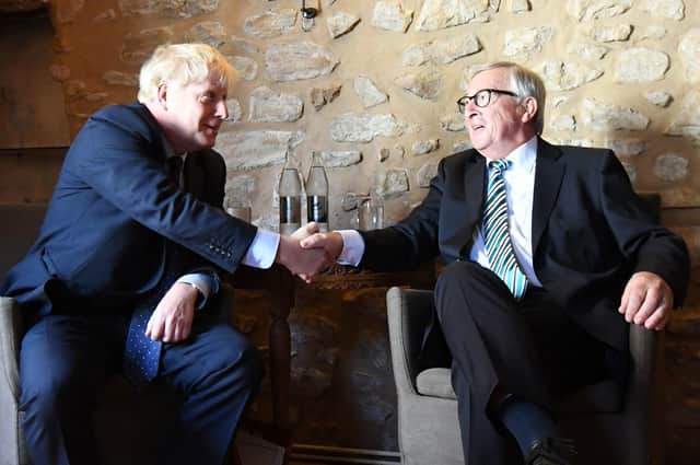 Boris Johnson with European Commission President Jean-Claude Juncker.