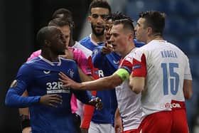 Glen Kamara of Rangers clashes with Ondrej Kudela of Slavia Praha during the UEFA Europa League Round of 16 Second Leg match between Rangers and Slavia Praha at Ibrox Stadium on March 18, 2021 in Glasgow, Scotland. (Photo by Ian MacNicol/Getty Images)