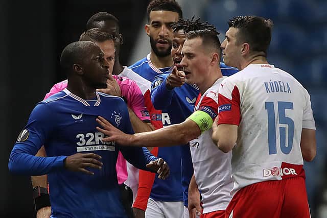 Glen Kamara of Rangers clashes with Ondrej Kudela of Slavia Praha during the UEFA Europa League Round of 16 Second Leg match between Rangers and Slavia Praha at Ibrox Stadium on March 18, 2021 in Glasgow, Scotland. (Photo by Ian MacNicol/Getty Images)