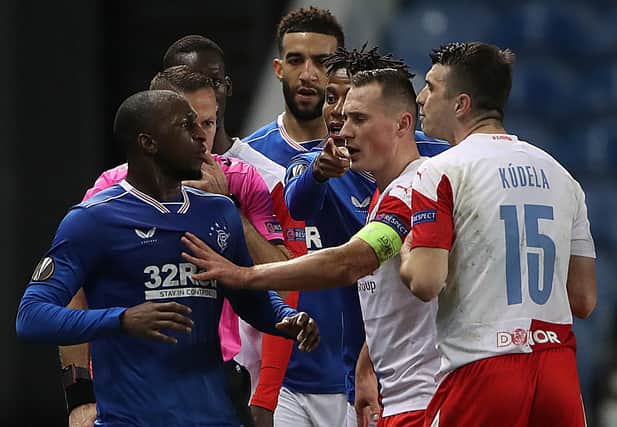 Glen Kamara of Rangers clashes with Ondrej Kudela of Slavia Praha during the UEFA Europa League Round of 16 Second Leg match between Rangers and Slavia Praha at Ibrox Stadium on March 18, 2021 in Glasgow, Scotland. (Photo by Ian MacNicol/Getty Images)