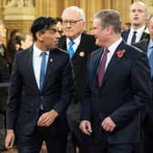 Rishi Sunak walks with Labour Party leader Sir Keir Starmer through the Central Lobby at the Palace of Westminster ahead of the State Opening of Parliament in the House of Lords.