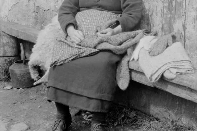 Mrs Annie Gillies, one of the last St. Kildans, pictured in 1930. She is listed in 1921 as living with her husband and three sons but by the time she left the island, she was widowed with just one boy remaining. PIC: NRS.
