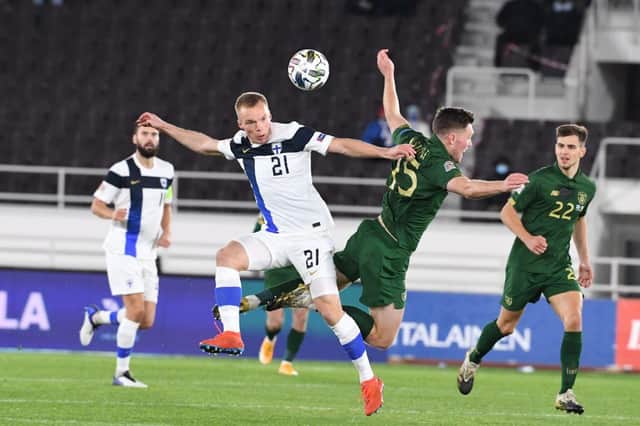 Finland's midfielder Ilmari Niskanen (L) and Ireland's defender Dara O'Shea vie for the ball during the UEFA Nations League match in Helsinki on October 14, 2020. (Photo by JUSSI NUKARI/LEHTIKUVA/AFP via Getty Images)