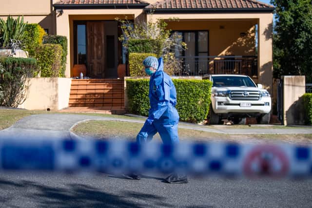 Police forensics examine the scene following the alleged break-in at the home of Toutai Kefu in August this year. Picture: Dan Peled/EPA-EFE/Shutterstock