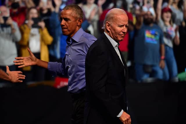 Former running mates Barack Obama and Joe Biden reunite for a common cause
(Photo by Mark Makela/Getty Images)