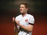 Australia internationalist Kye Rowles has signed a new long-term deal with Hearts.