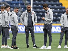 United assess the surface before the Premiership kick-off. (Photo by Rob Casey / SNS Group)
