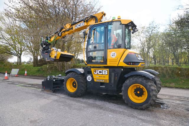 JCB said its PotholPro could complete repairs far faster and cheaper than by using traditional methods. Picture: JCB