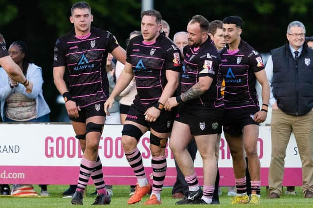 Ayrshire Bulls' Blair Macpherson celebrates after scoring a try during a FOSROC Super Series Sprint final against Heriot's at Millbrae.