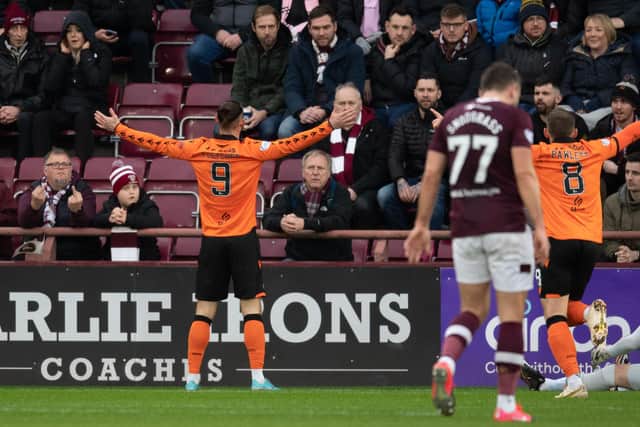 Steven Fletcher celebrates putting Dundee United in front against Hearts. Picture: SNS
