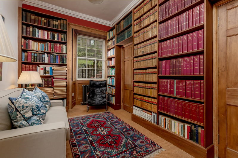 The ground-floor library offers the ideal space in which to relax with a good book.
