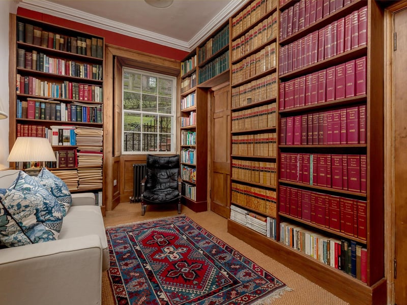 The ground-floor library offers the ideal space in which to relax with a good book.