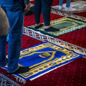 Muslims take part in morning prayers on Eid al-Adha at The Mevlana Mosque in Rotterdam in 2021, as they join others celebrating the Festival of Sacrifice across the world. Photo: Lex van LIESHOUT / ANP / AFP) / Netherlands OUT via Getty Images.