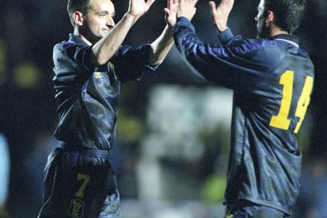 Pat Nevin celebrates with Darren Jackson after scoring in Scotland's 5-0 win over San Marino in a Euro '96 qualifier in 1995. Nevin was left out of the squad for the finals