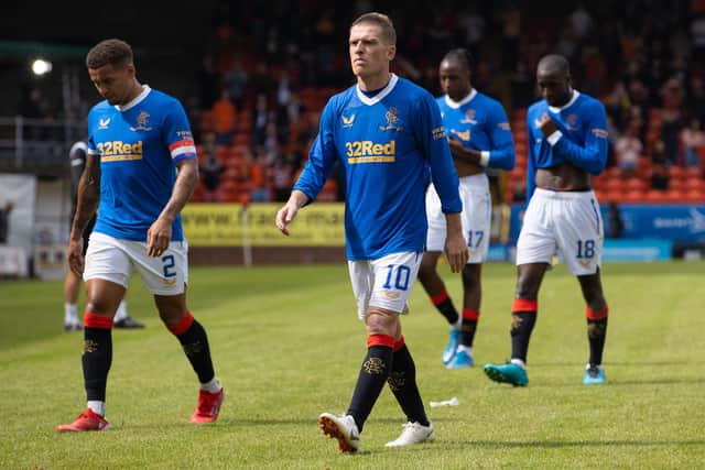 Dejected Rangers stars trudge off at full-time. Picture: SNS