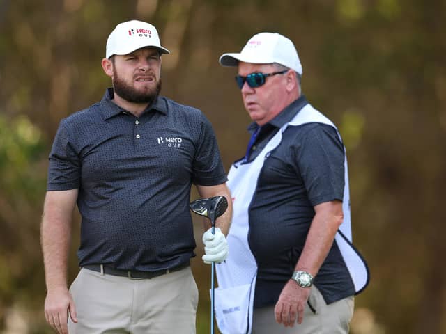 Tyrrell Hatton pictured with caddie Mick Donaghy during the 2023 Hero Cup at Abu Dhabi Golf Club. Picture: Andrew Redington/Getty Images.