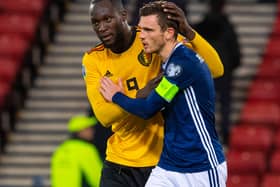 GLASGOW, SCOTLAND - SEPTEMBER 9: Scotland's Andy Robertson is consoled by Romelu Lukaku at full time during a UEFA Euro 2020 qualifier between Scotland and Belgium, at Hampden Park, on September 9, 2019, in Glasgow, Scotland. (Photo by Alan Harvey / SNS Group)