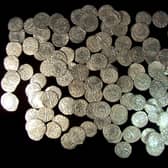 A collection of Edward I and II silver pennies. A hoard of similar coins, featuring more than 8,000 individual pieces, has been found by a metal detectorist in Dunscore near Dumfries. PIC: CC.