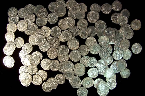 A collection of Edward I and II silver pennies. A hoard of similar coins, featuring more than 8,000 individual pieces, has been found by a metal detectorist in Dunscore near Dumfries. PIC: CC.