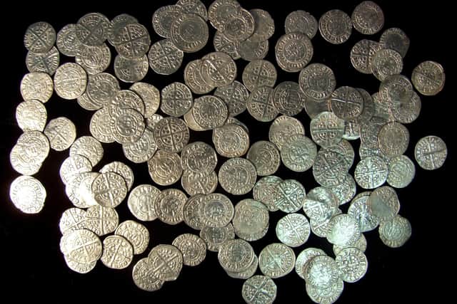 A collection of Edward I and II silver pennies. A hoard of similar coins, featuring more than 8,000 individual pieces, has been found by a metal detectorist in Dunscore near Dumfries. PIC: CC.