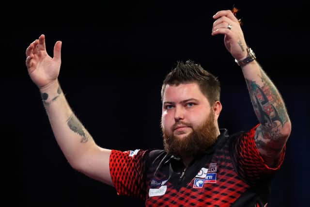 Michael Smith during the Final against Peter Wright of The William Hill World Darts Championship at Alexandra Palace. (Photo by Luke Walker/Getty Images)