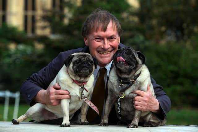 Conservative MP David Amess with his pugs, Lily and Boat at the Westminster Dog of the Year competition at Victoria Tower Gardens in London. Conservative MP Sir David Amess died after being stabbed at a surgery in his Southend West constituency.