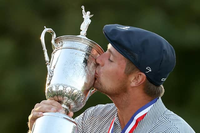 New US Open champion Bryson DeChambeau kisses the trophy in celebration after his six-shot success at Winged Foot. Picture: Gregory Shamus/Getty Images