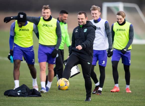Hibs manager Shaun Maloney in upbeat mood during training with his players on Monday ahead of the Edinburgh derby showdown with Hearts at Easter Road on Tuesday night. (Photo by Paul Devlin / SNS Group)