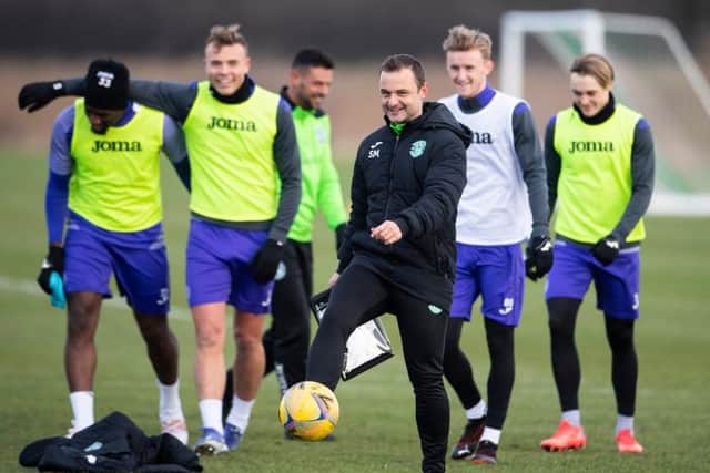 Hibs manager Shaun Maloney in upbeat mood during training with his players on Monday ahead of the Edinburgh derby showdown with Hearts at Easter Road on Tuesday night. (Photo by Paul Devlin / SNS Group)