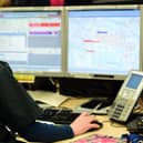 A Scottish Ambulance Service call handler in Cardonald Glasgow. Picture: PA