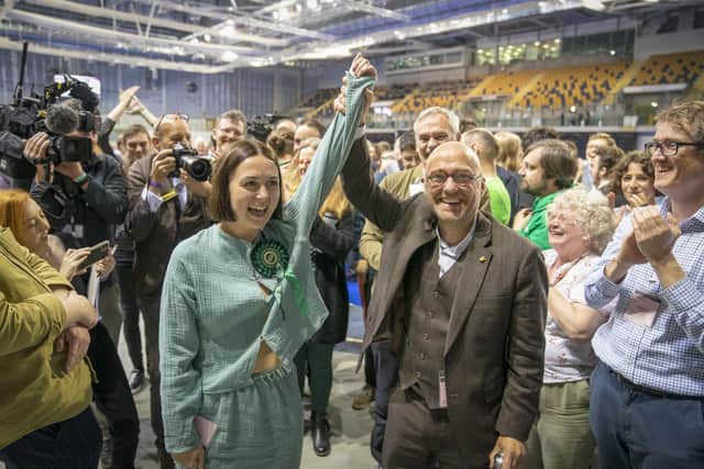 Newly elected Scottish Green councillor Holly Bruce celebrates with party co-leader Patrick Harvie. Picture: Jane Barlow/PA Wire