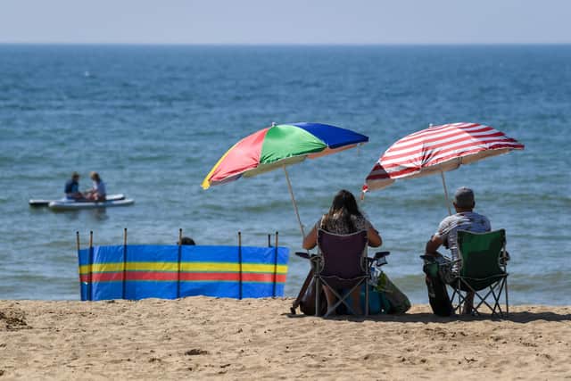 Scots will be eager to bask in the sun during August bank holiday weekend (Getty Images)