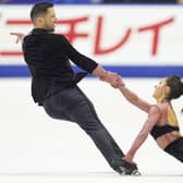 CORRECTS DATE - Lilah Fear and Lewis Gibson of Britain perform in the ice dance rhythm dance program during the ISU Grand Prix of Figure Skating - NHK Trophy in Kadoma, near Osaka, Japan. (AP Photo/Tomohiro Ohsumi)