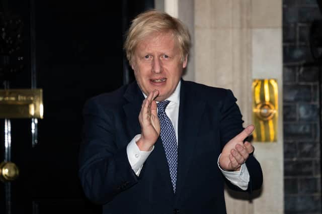 Boris Johnson applauds NHS staff and carers outside 10 Downing Street (Picture: Aaron Chown/PA Wire)