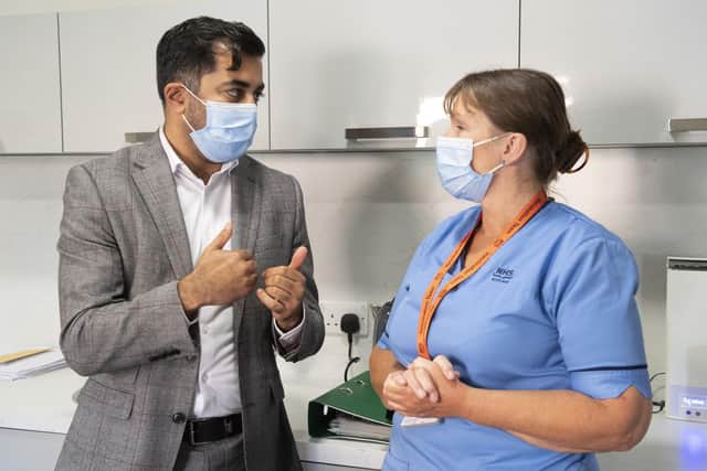 Health secretary Humza Yousaf talks with registered nurse Laura Hastings at Victoria Manor Care home in Edinburgh. Picture: Lesley Martin - Pool/Getty images