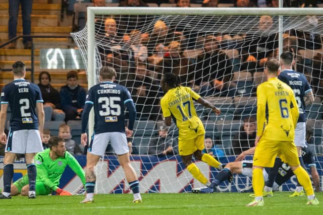 Regan Charles-Cook nets Ross County's fourth against Dundee at a stunned Dens Park (Photo by Mark Scates / SNS Group)