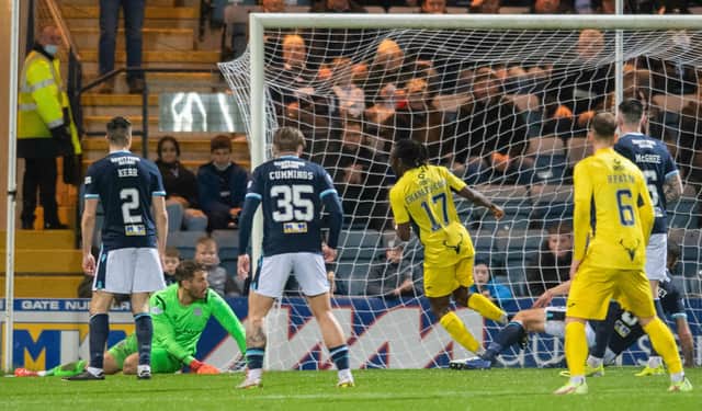 Regan Charles-Cook nets Ross County's fourth against Dundee at a stunned Dens Park  (Photo by Mark Scates / SNS Group)