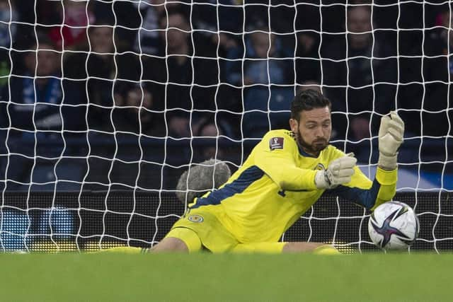 Craig Gordon makes an important save from an Eran Zahavi header in the 3-2 win over Israel. (Photo by Craig Foy / SNS Group)