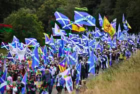 Scottish pro-independence supporters hold a march and rally outside the Scottish Parliament in Edinburgh. Photo by Jeff J Mitchell/Getty