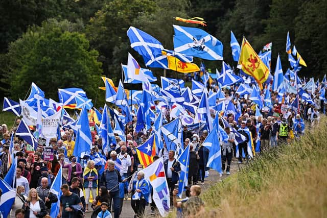 Scottish pro-independence supporters hold a march and rally outside the Scottish Parliament in Edinburgh. Photo by Jeff J Mitchell/Getty